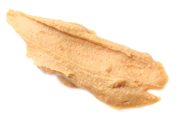 Sample of tasty nut butter isolated on white, top view