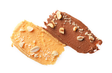 Different nut butters and nuts isolated on white, top view