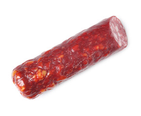 Piece of delicious dry cured sausage isolated on white, top view