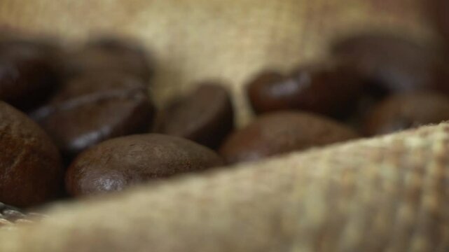 Roasted coffee beans on the table.
