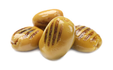 Many grilled green olives isolated on white