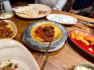 Delicious hummus with chickpeas, olive oil, lemon and pita bread. Vegetarian food concept