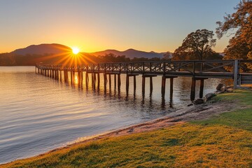 Fototapeta premium Long wooden pier extending into expansive lake at sunset, warm hues reflecting on the water’s surface during golden hour.