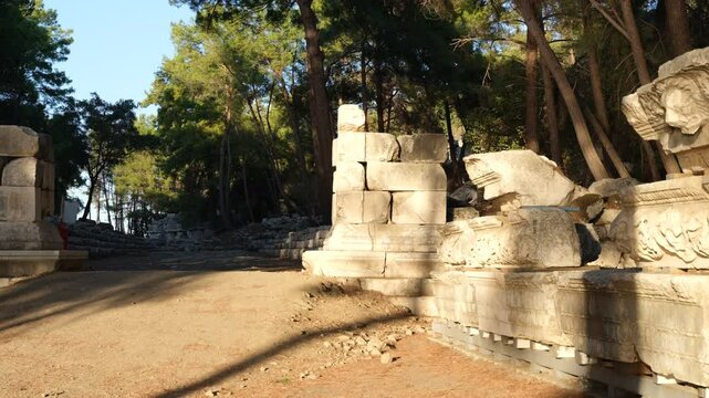 The ruins of Hadrians Gate on the shore of the southern harbour of Phaselis. Phaselis ancient city. Antalya province, Turkey country 