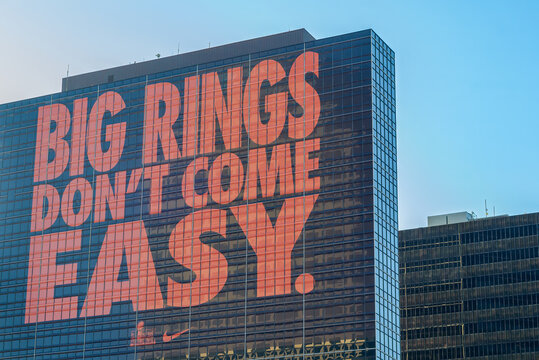New Orleans, LA, USA - January 25, 2025: Nike ad for Super Bowl LIX that says "Big Rings Don't Come Easy" on Side of Office Building in the Central Business District