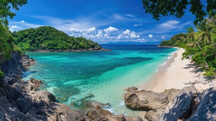 Fototapeta premium Panoramic tropical beach with turquoise sea, bright white sand, and swaying palm trees under a sunny blue sky