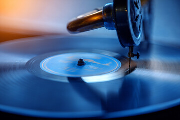 An old record is played on an old gramophone.