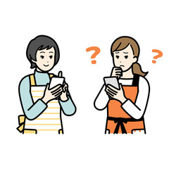Women having a conversation while holding a cell phone.
