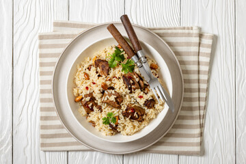 beef and rice in white bowl, top view