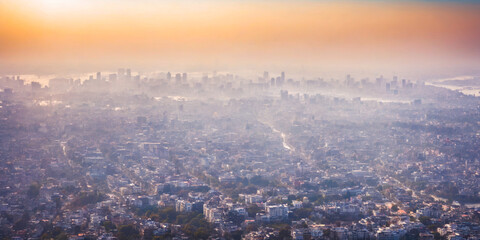 Fototapeta premium Smog over City at Sunrise