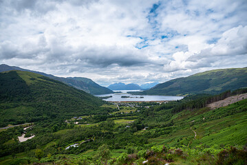 Landscape photography of mountains and lake Loch Leven, hills and pathway trail, scenic viewpoint,  travel, hiking, village Ballachulish, Glencoe, Scotland, UK, Highland