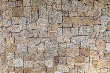 Wall Stone Background. Brown Cut Stone Background.