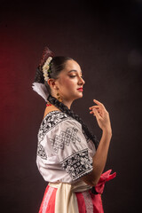 Fototapeta premium A woman wearing a white dress with black