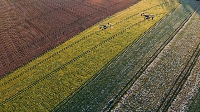 Exploring hi-tech drones navigating vibrant fields with futuristic vfx and advanced hud technology