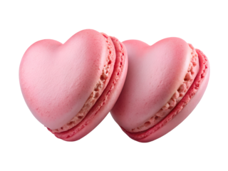 Cut-out of realistic two pink color heart shaped macarons on white isolated transparent background.