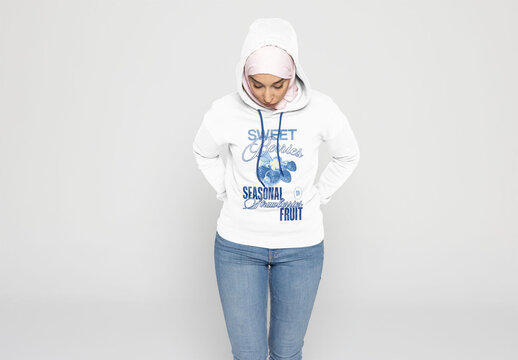 Muslim Woman in Hoodie and Hijab Looking Down Thoughtfully. Mockup customizable in color and design