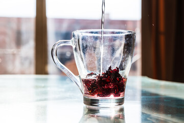 Red Hibiscus tea in the cup. Karkade tea for ramadan celebrations 
