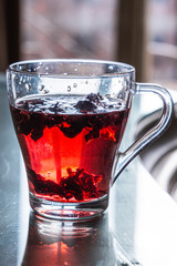 Red Hibiscus tea in the cup. Karkade tea for ramadan celebrations 