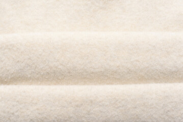 Fototapeta premium Background texture of white woven fabric for wear made of fiber synthetic and wool.