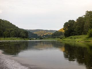 Elbe valley nature with beautiful forests and sandstone mountains. The Kurort Rathen is visible...