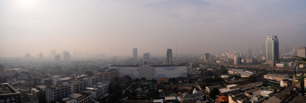 Panorama of Bangkok Cityscape with PM 2.5 Air Pollution Haze, Urban Smog Over Skyline, Foggy Atmosphere in the Metropolis