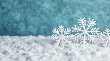 Snowflakes on Soft White Snow Against a Blue Winter Background