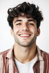 Fototapeta premium Happy young man smiling at the camera