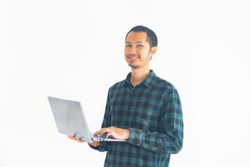 Bearded man wearing flannel is holding laptop and smile on isolated white background