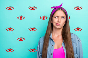 Photo of unsure brunette young lady look empty space wear pink t-shirts hairband jeans shirt...