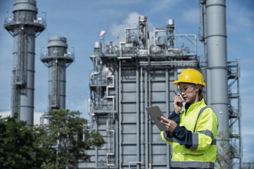 worker in the construction. portrait of a engineer. Portrait woman worker in factory with plant. Portrait woman engineer on power plant background.	
