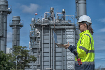 worker in the construction. portrait of a engineer. Portrait woman worker in factory with plant. Portrait woman engineer on power plant background.	
