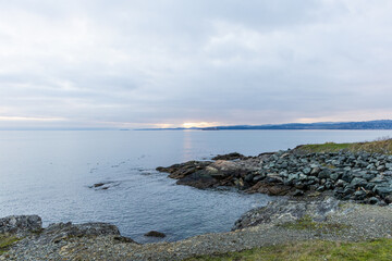 Peaceful Coastal View from Vancouver Island During a Cloudy Morning