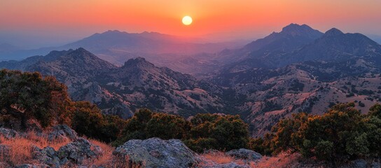 Sunset mountain range vista, panoramic view. Wallpaper, travel