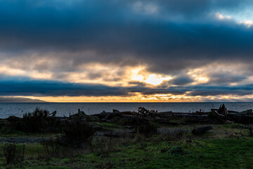 Serene Vancouver Island Sunset with Clouds Over the Ocean View