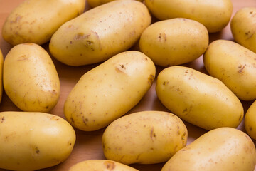 Neatly arranged potatoes in paper crate