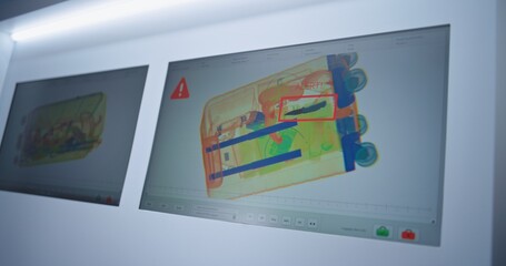 Advanced Security System in Airport: Computer Screens Displaying Modern Software Interface or...