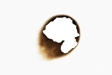 Burned hole on a white paper with clipping path.