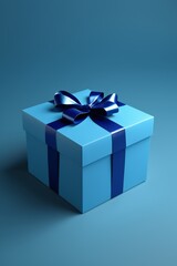 Obraz premium a close up of a blue gift box with a blue ribbon