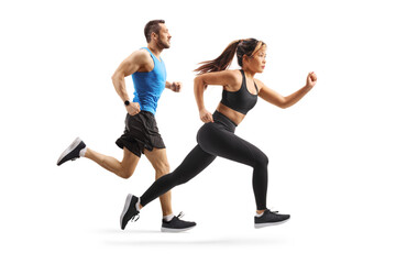 Full length profile shot of a group of a man and woman running a race