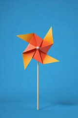 Fototapeta premium there is a pinwheel on a stick with a blue background