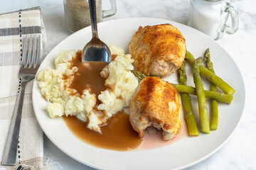 seasoned chicken thighs with mashed potatoes