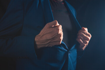 man in a blue suit with a black jacket