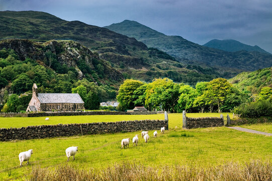 St. Mary's Church in the Snowdonia mountains village of Beddgelert, Gwynedd, north Wales.  North east to Y Lliwedd and Yr Aran