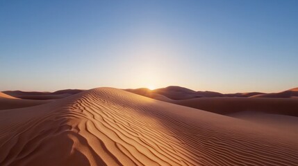 Sunset Over Orange Sand Dunes in a Vast Desert