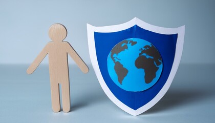 종이로 만들어진 푸른 지구와 보호막 모양이 결합된 종이인형