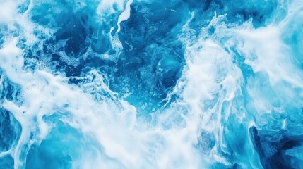 Fototapeta premium Ocean waves, white foam, blue water, aerial view, background texture