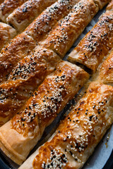 Traditional turkish minced meat and sesame pastry