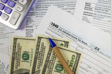 us tax forms 1040. For 2023, business tax time concept.