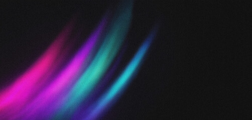 Vibrant pink, purple, and blue light beams on a deep black background