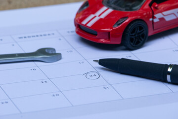 Vehicle Repair Appointment: Marked Date with Tools and Mini Car